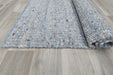 harmonious blend of soft blues, grays, and whites with subtle hints of black- Rugs Direct 