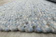 harmonious blend of soft blues, grays, and whites with subtle hints of black- Rugs Direct 