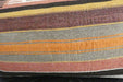 A close-up of a woven textile with horizontal stripes in olive green, orange, burgundy, mustard yellow, and black.