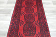 Red Afghan Turkman Bokhara hand-knotted wool rug featuring traditional repeating Gul medallions, 100 × 200 cm.Rugs Direct NZ