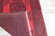 Red Afghan Turkman Bokhara hand-knotted wool rug featuring traditional repeating Gul medallions, 100 × 200 cm.Rugs Direct NZ