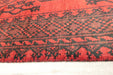 Red Afghan Turkman Bokhara hand-knotted wool hallway runner featuring repeating oval Gul medallions and traditional geometric borders.Rugs Direct NZ