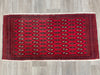 Red Persian rug on the floor