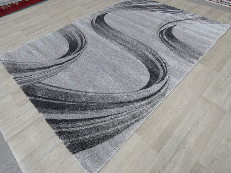 Swirl Abstract Style Aroha Rug in Grey - Rugs Direct